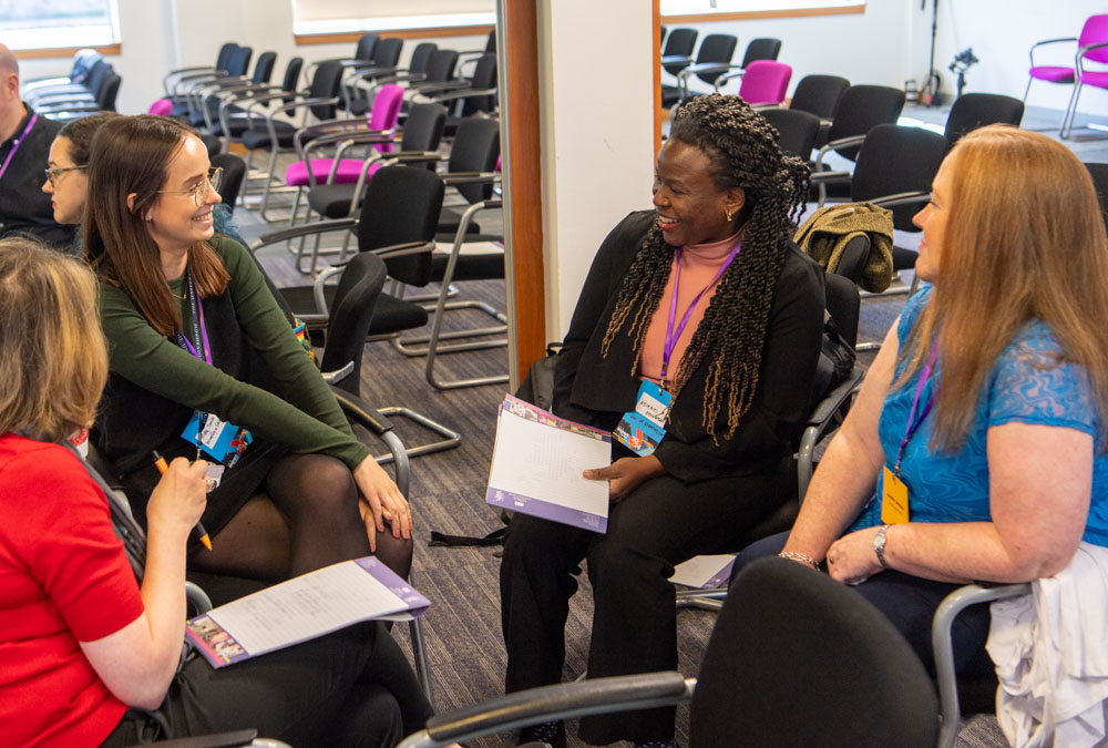 Delegates networking at the IAA Impact Festival 2024.
