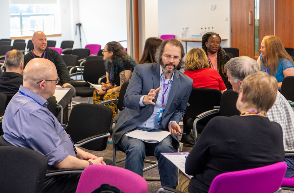 Delegates networking at the IAA Impact Festival 2024.