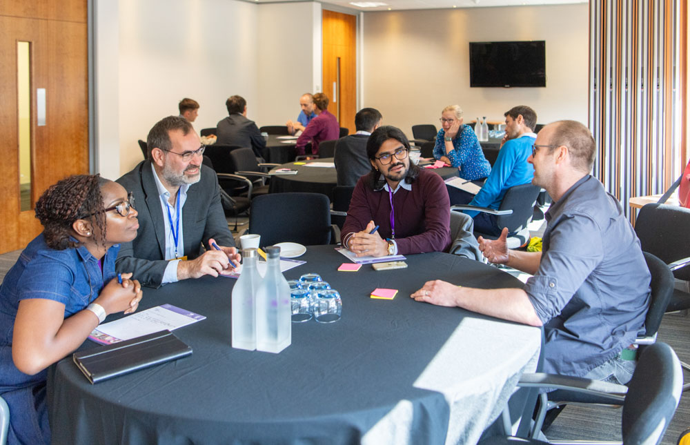 Delegates networking at the IAA Impact Festival 2024.