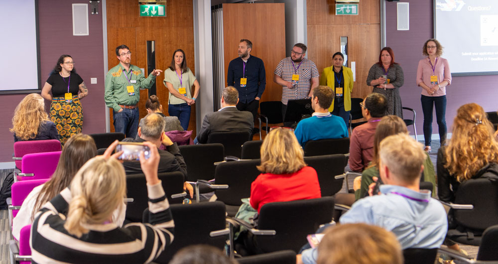 Photo of the Impact Teams answering questions about the new cross-institutional funding call.